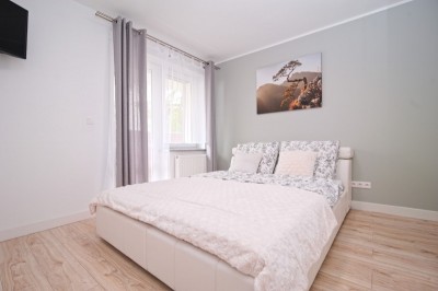 Zdjęcie przedstawia łoże w apartamencie Apartamenty Bernardo