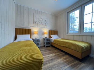 Fotografia przedstawia spanie w pokoju - Lawendowy Zakątek pod Śnieżką | Miłków (wypoczywaj w górach) 