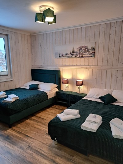 Fotografia przedstawia łoże w domu do wynajęcia Lawendowy Zakątek pod Śnieżką