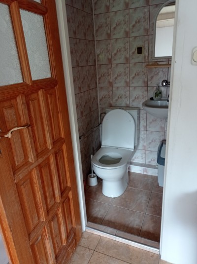 Fotka przedstawia łazienkę w pensjonacie Dom Gościnny GRZESIUK
