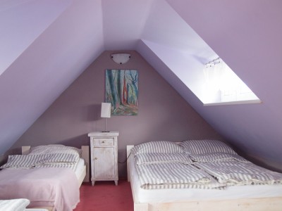 Na zdjęciu łoże w pokoju - Domki i pokoje KLARA | Pobierowo (wypoczywaj nad morzem) 