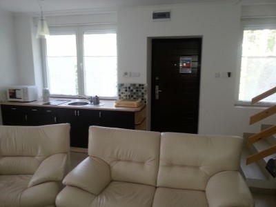 Zdjęcie przedstawia pokój w pokoju Apartamenty KLIF w Pobierowie (woj. zachodniopomorskie)