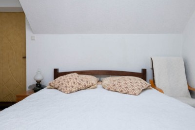 Zdjęcie przedstawia łoże w pokoju - KRYSTYNA | Niechorze (wypoczywaj nad morzem) 