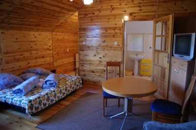 Na fotce widzimy pokój w pokoju Dom Gościnny U WOJTKA w którym macie możliwość Państwo się zatrzymać podczas urlopu w Niechorzu