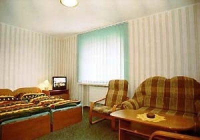 Fotografia wnętrza pokoju w pensjonacie POLONIA SPA - BASEN