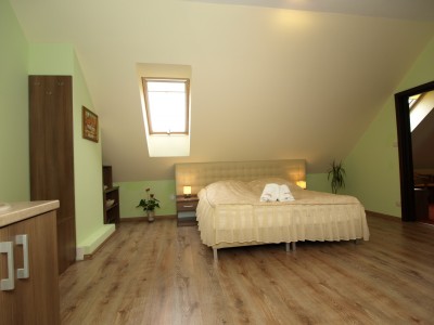 Zdjęcie przedstawia łoże w pokoju - Villa Avena | Niechorze (wypoczywaj nad morzem) 