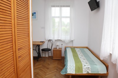 Na zdjęciu widzimy pokój w pokoju Wczasowisko SYRENA w którym możecie Państwo się zatrzymać podczas urlopu w Niechorzu