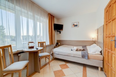 Zdjęcie przedstawia łoże w pokoju - Ambre Mare | Pobierowo (wypoczywaj nad morzem) 