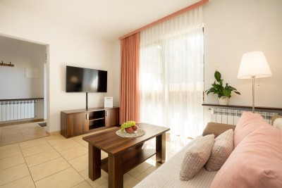 W takim pokoju można wypocząć w apartamencie Apartamenty EWiTA nad morzem w Sarbinowie