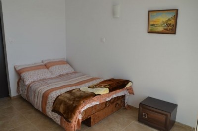 Zdjęcie przedstawia spanie małżeńskie w pokoju - Domki - Apartamenty La Mar | Sarbinowo (wypoczywaj nad morzem) 