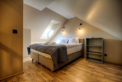 Zdjęcie przedstawia łoże w pokoju - Apartamenty BURSZTYNOWA 17 | Niechorze (wypoczywaj nad morzem) 
