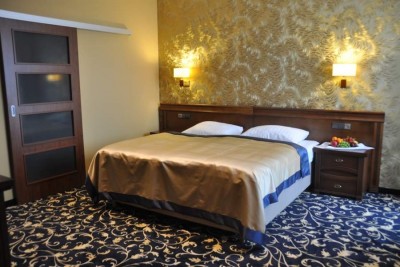 Hotel Hotel DZIKI POTOK *** Konferencje & SPA - łoże małżeńskie w pokoju
