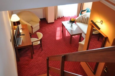 Fotografia przedstawia pokój w hotelu Hotel DZIKI POTOK *** Konferencje & SPA w Karpaczu (woj. dolnośląskie)